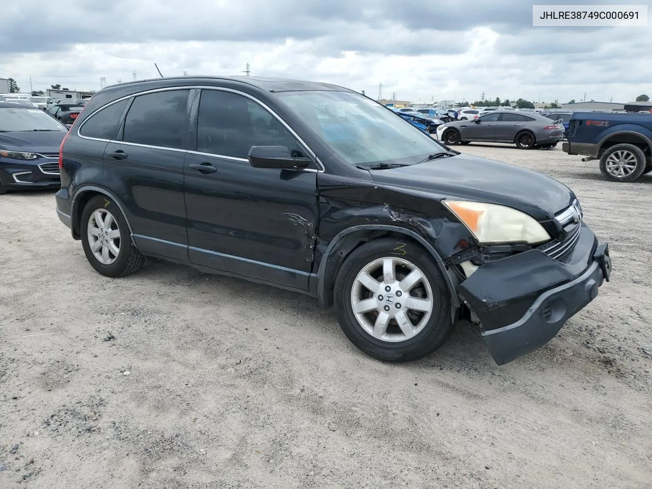 2009 Honda Cr-V Exl VIN: JHLRE38749C000691 Lot: 70089644