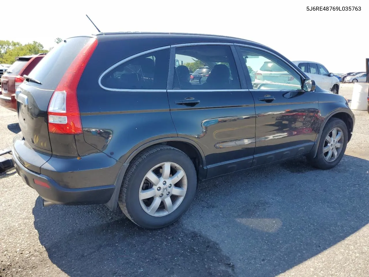 2009 Honda Cr-V Exl VIN: 5J6RE48769L035763 Lot: 70957404