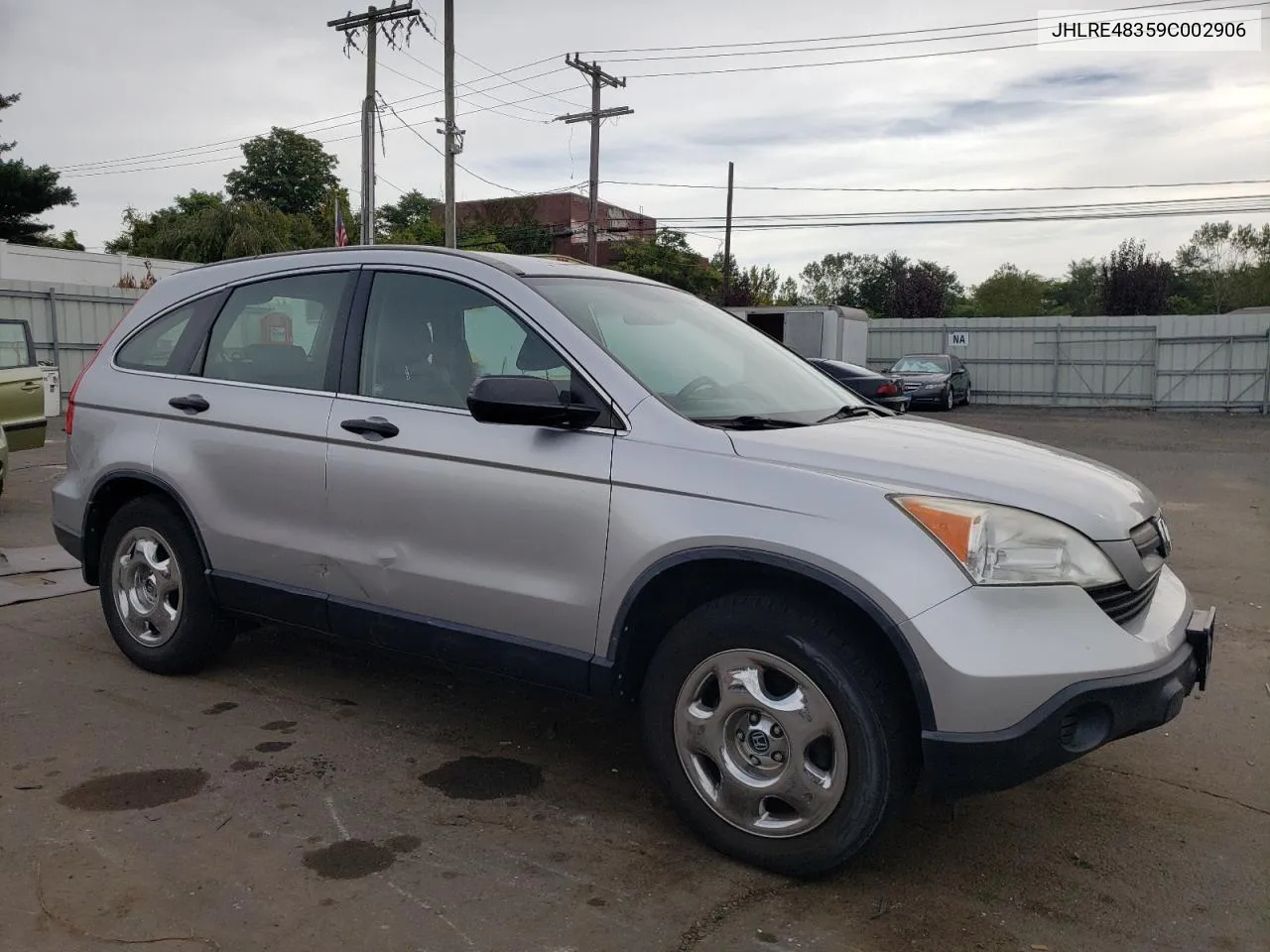 2009 Honda Cr-V Lx VIN: JHLRE48359C002906 Lot: 71958974