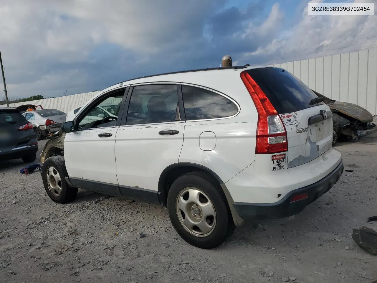 2009 Honda Cr-V Lx VIN: 3CZRE38339G702454 Lot: 72768634