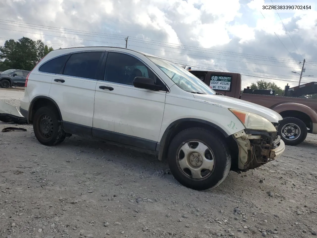 2009 Honda Cr-V Lx VIN: 3CZRE38339G702454 Lot: 72768634