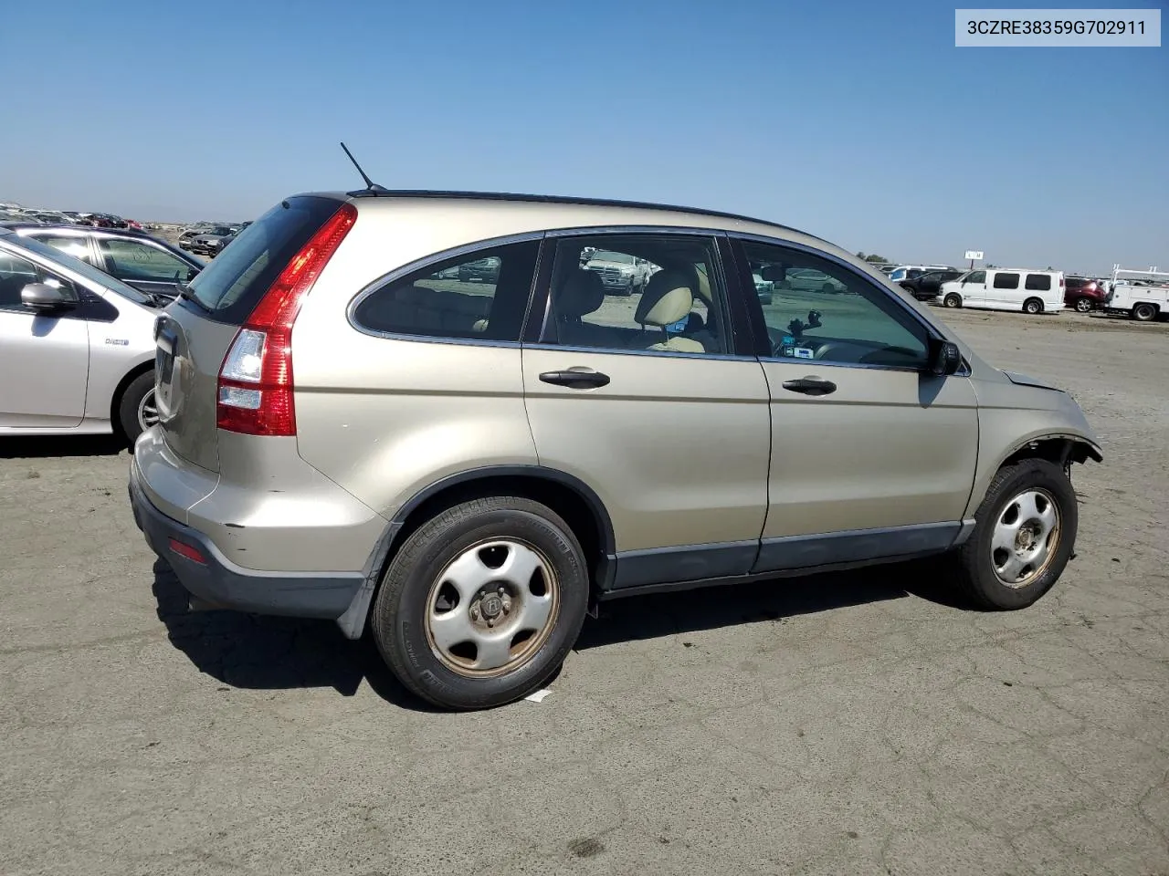 2009 Honda Cr-V Lx VIN: 3CZRE38359G702911 Lot: 72946724