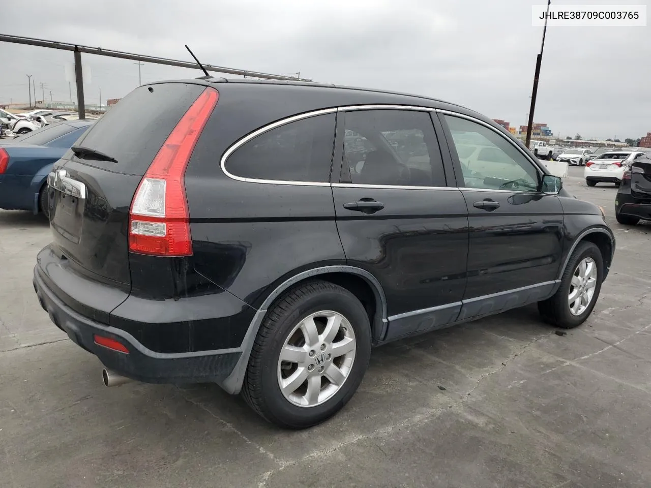 2009 Honda Cr-V Exl VIN: JHLRE38709C003765 Lot: 72998664