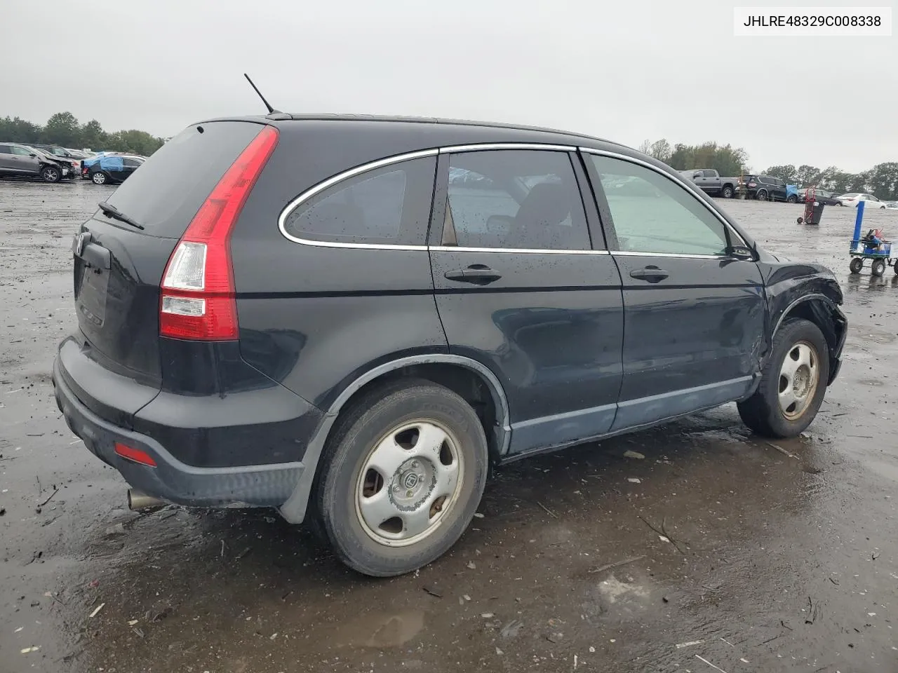 2009 Honda Cr-V Lx VIN: JHLRE48329C008338 Lot: 73759334