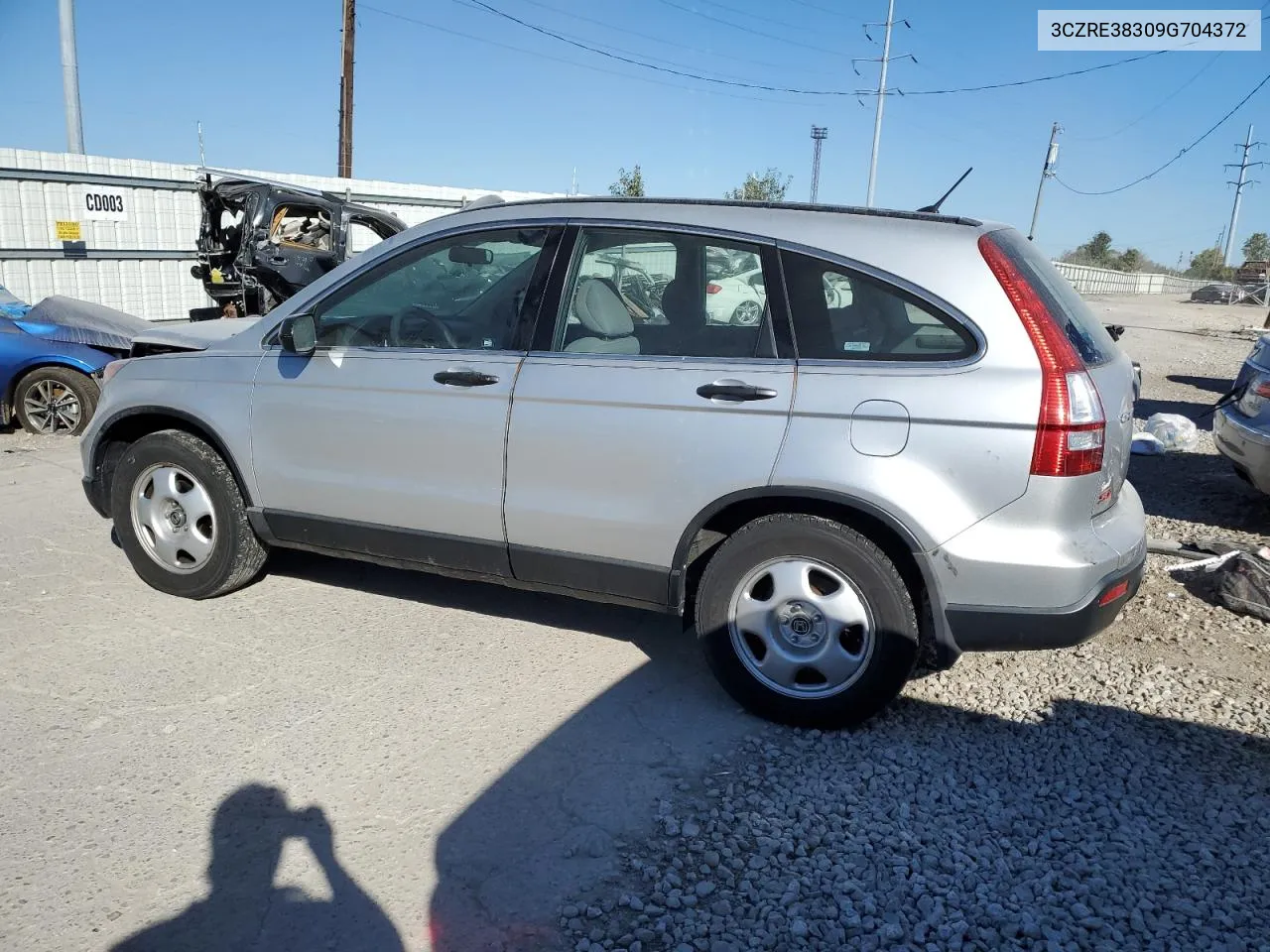 2009 Honda Cr-V Lx VIN: 3CZRE38309G704372 Lot: 74676014