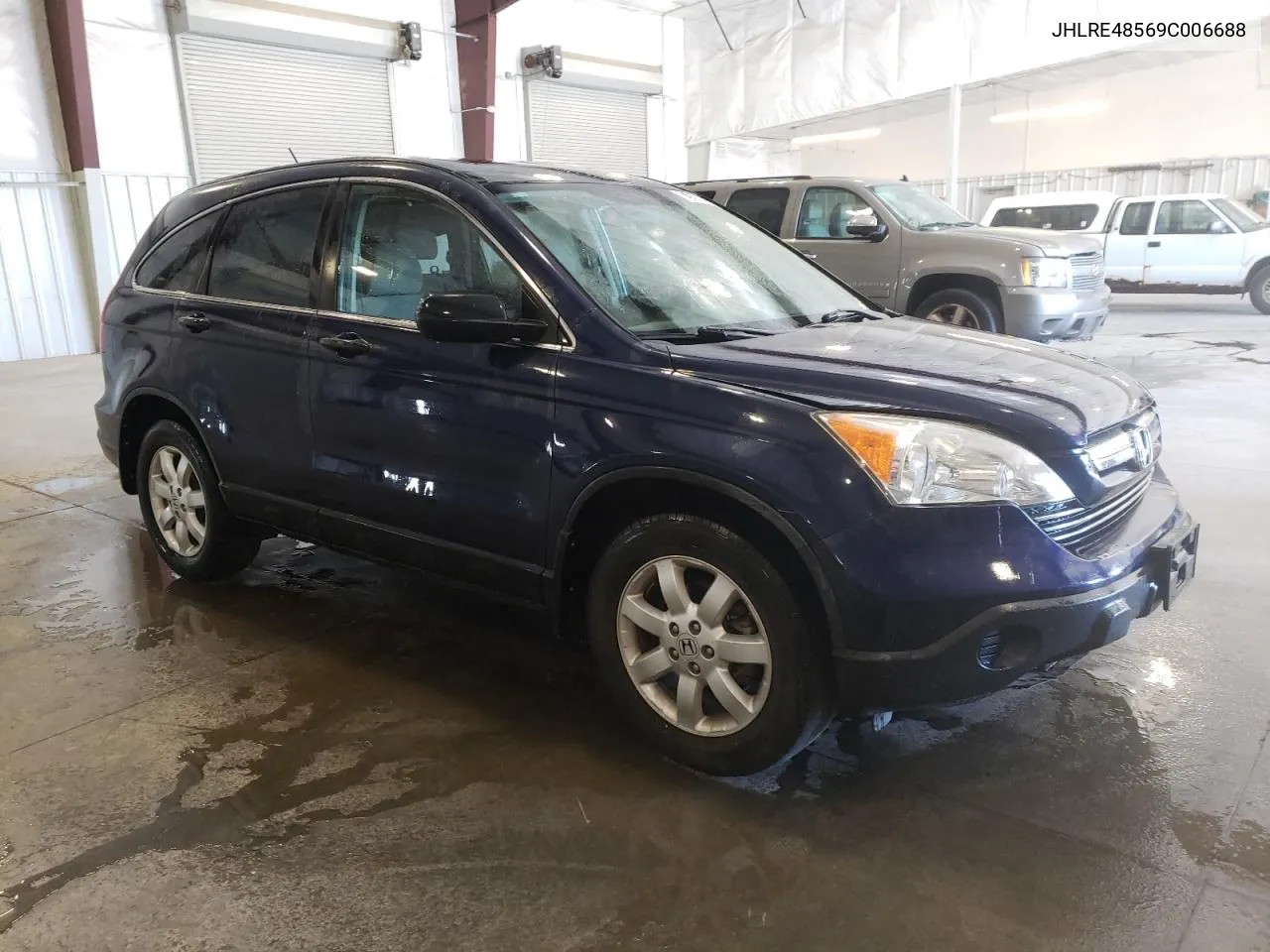 2009 Honda Cr-V Ex VIN: JHLRE48569C006688 Lot: 74900944