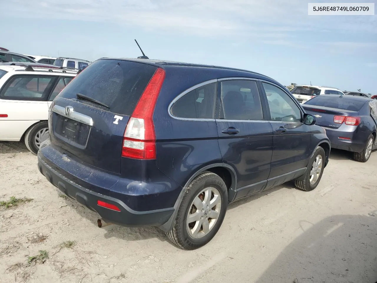 2009 Honda Cr-V Exl VIN: 5J6RE48749L060709 Lot: 74936534