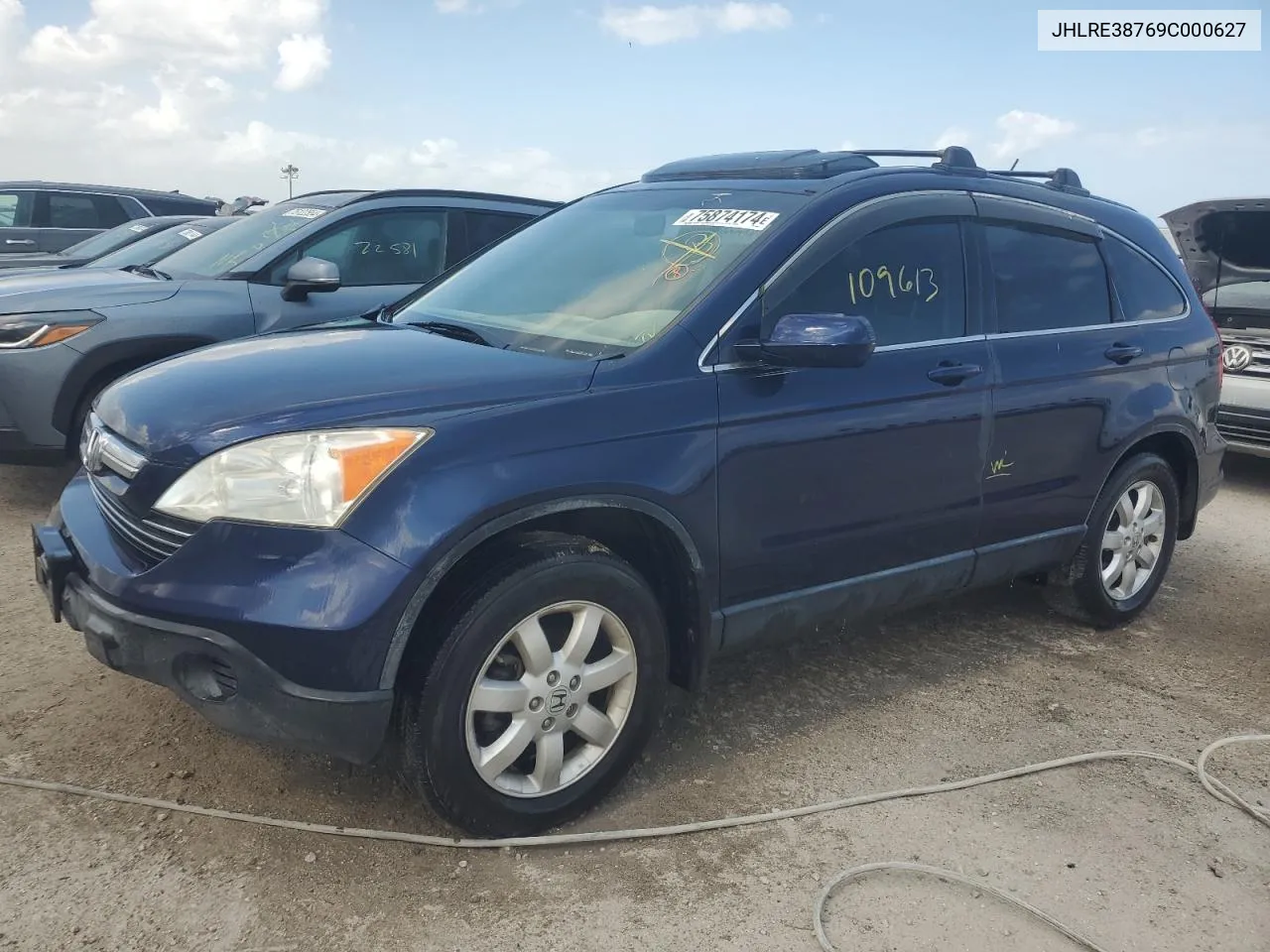 2009 Honda Cr-V Exl VIN: JHLRE38769C000627 Lot: 75874174