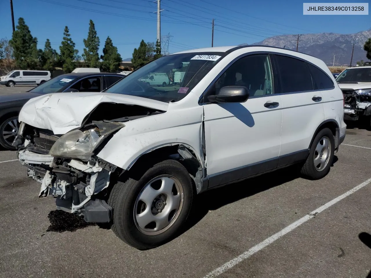 2009 Honda Cr-V Lx VIN: JHLRE38349C013258 Lot: 76417834