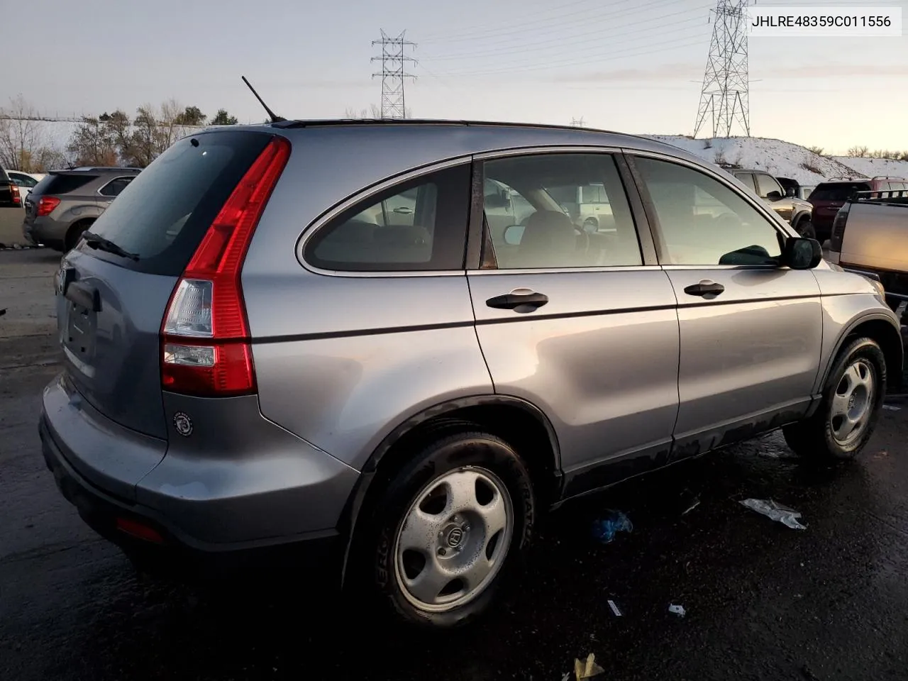 2009 Honda Cr-V Lx VIN: JHLRE48359C011556 Lot: 79107844