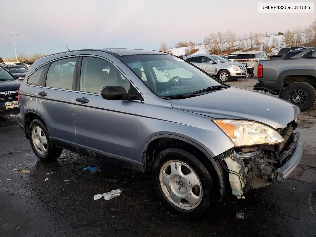 2009 Honda Cr-V Lx VIN: JHLRE48359C011556 Lot: 79107844