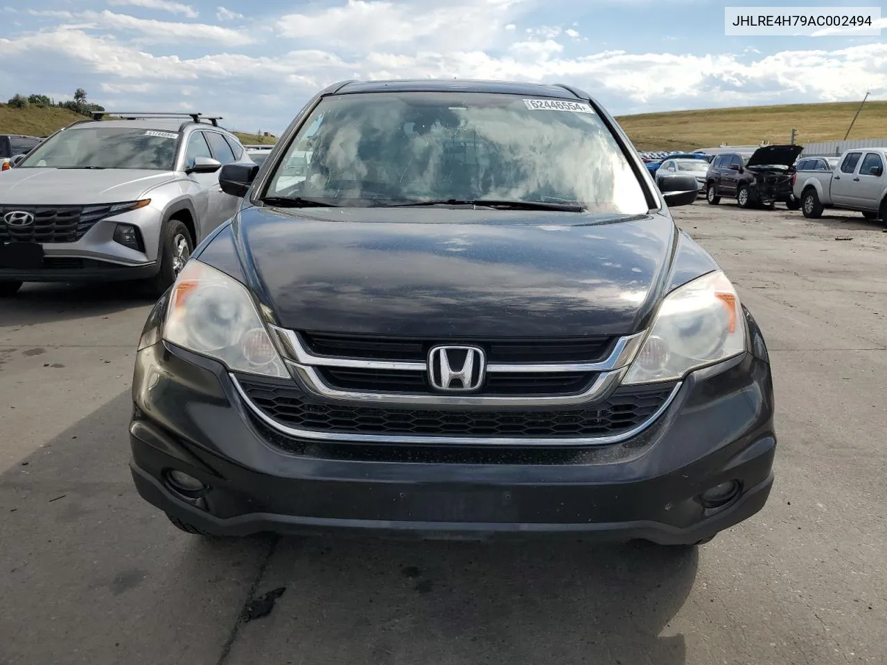 2010 Honda Cr-V Exl VIN: JHLRE4H79AC002494 Lot: 62446554