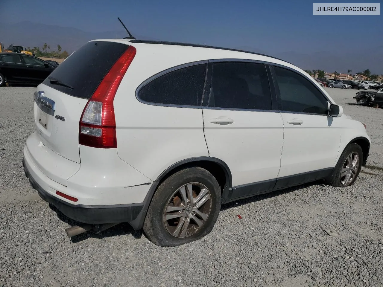 2010 Honda Cr-V Exl VIN: JHLRE4H79AC000082 Lot: 76206654