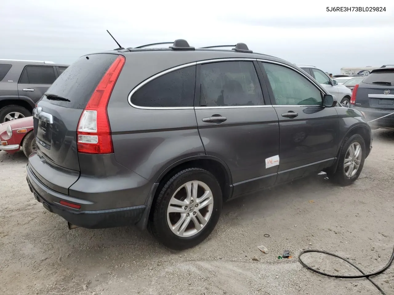 2011 Honda Cr-V Exl VIN: 5J6RE3H73BL029824 Lot: 74890104