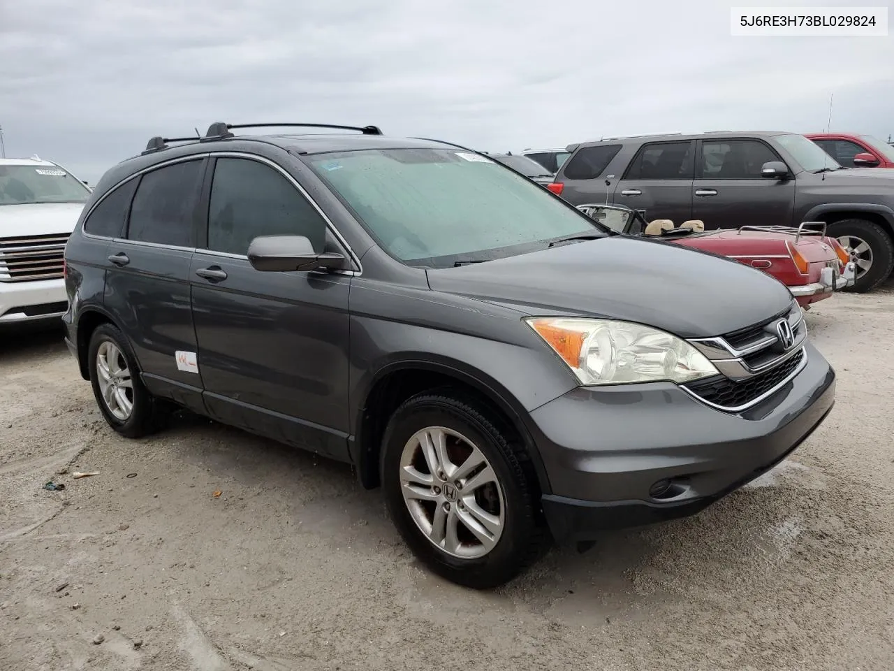 2011 Honda Cr-V Exl VIN: 5J6RE3H73BL029824 Lot: 74890104