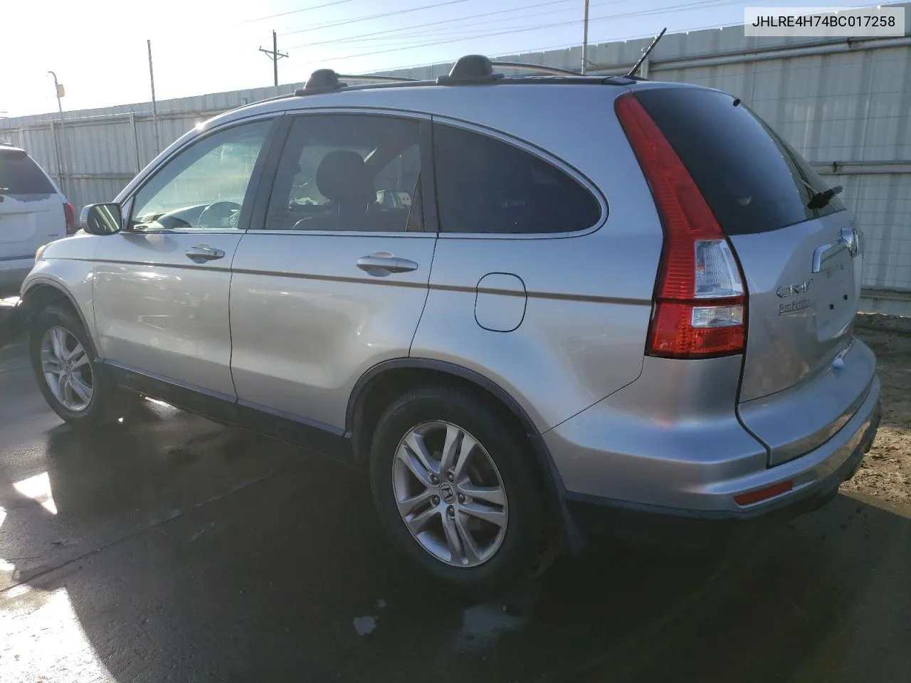 2011 Honda Cr-V Exl VIN: JHLRE4H74BC017258 Lot: 77705044