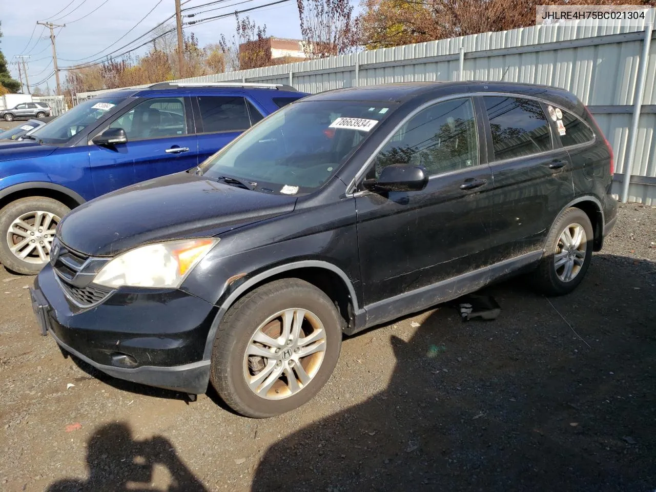 2011 Honda Cr-V Exl VIN: JHLRE4H75BC021304 Lot: 78663934