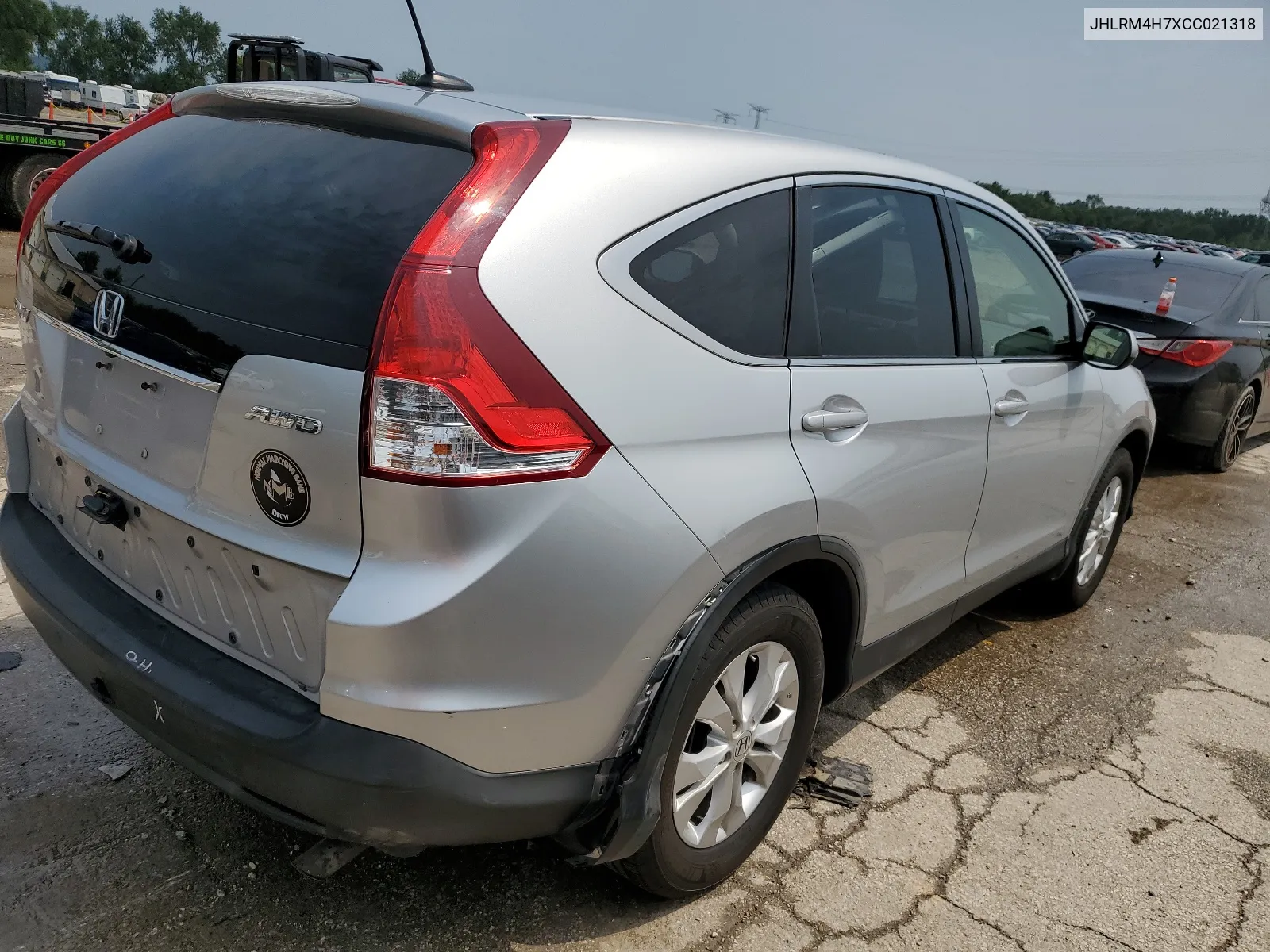 2012 Honda Cr-V Exl VIN: JHLRM4H7XCC021318 Lot: 64463144