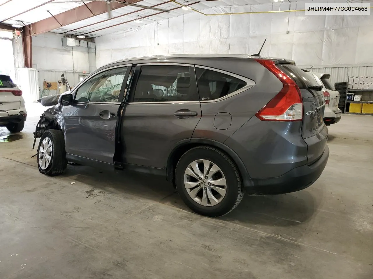 2012 Honda Cr-V Exl VIN: JHLRM4H77CC004668 Lot: 66372884