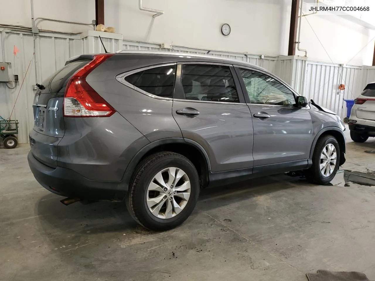 2012 Honda Cr-V Exl VIN: JHLRM4H77CC004668 Lot: 66372884