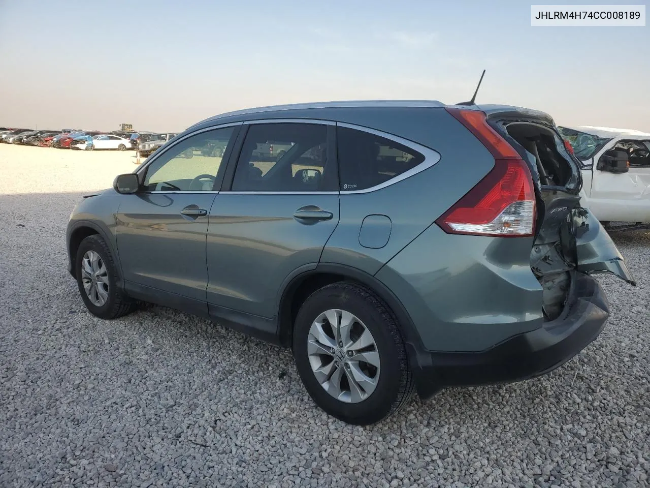 2012 Honda Cr-V Exl VIN: JHLRM4H74CC008189 Lot: 74265244