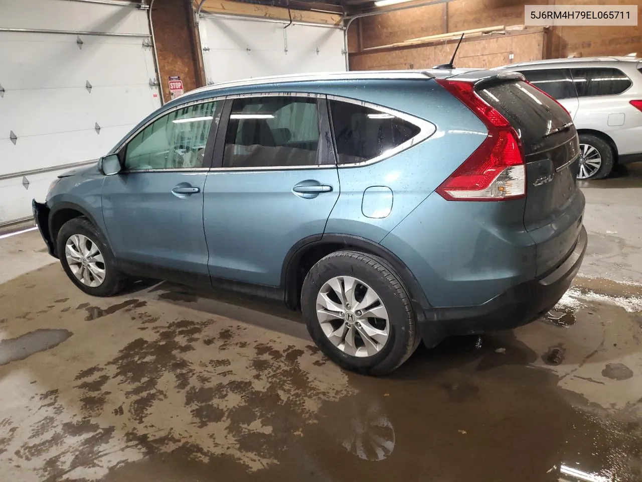 2014 Honda Cr-V Exl VIN: 5J6RM4H79EL065711 Lot: 75642114