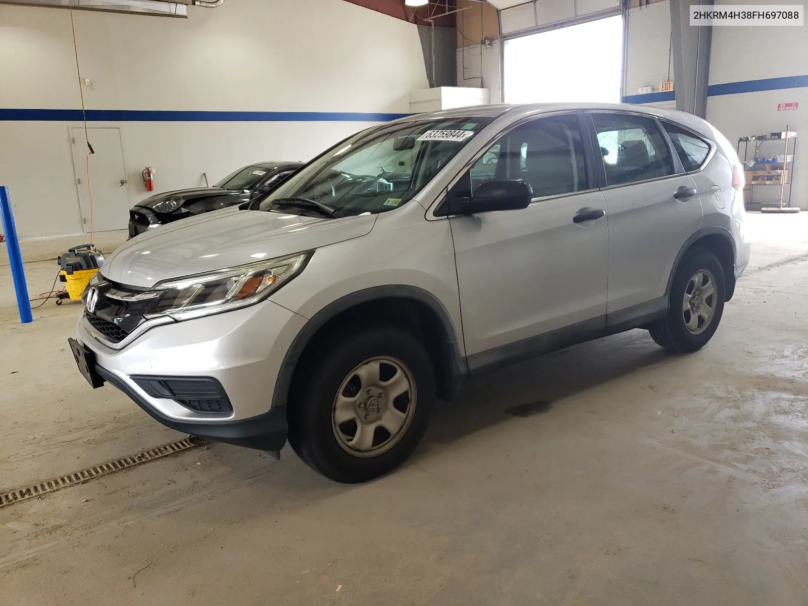 2015 Honda Cr-V Lx VIN: 2HKRM4H38FH697088 Lot: 63259844