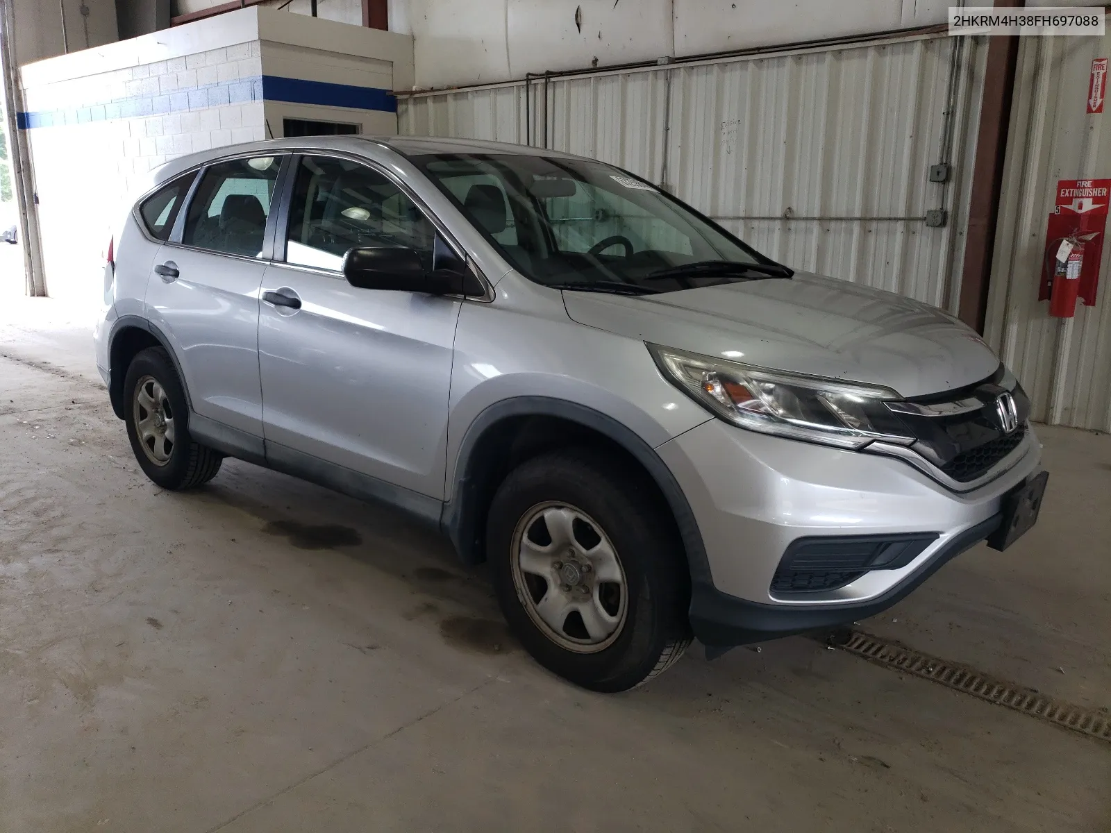 2015 Honda Cr-V Lx VIN: 2HKRM4H38FH697088 Lot: 63259844