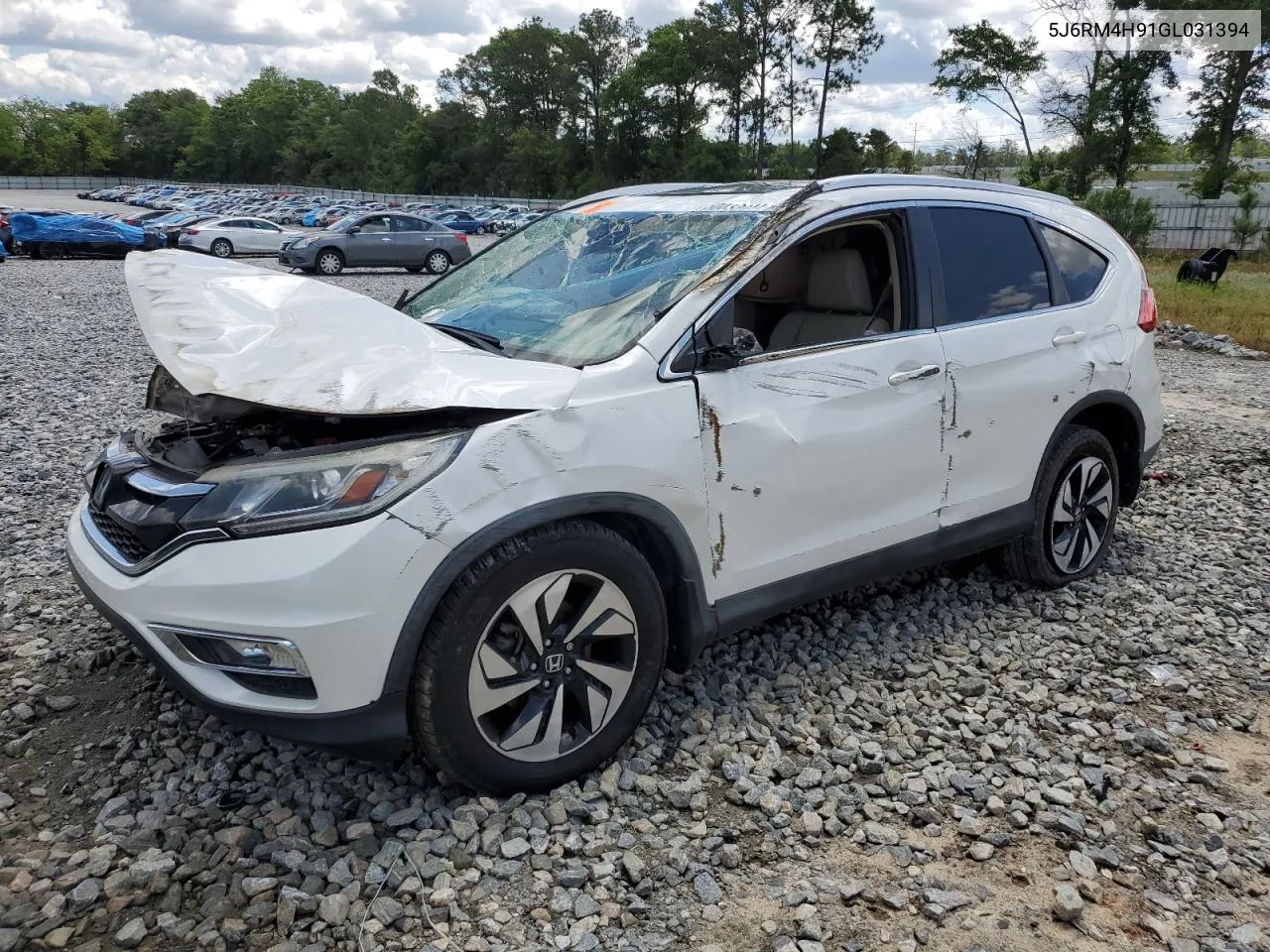 2016 Honda Cr-V Touring VIN: 5J6RM4H91GL031394 Lot: 50032044