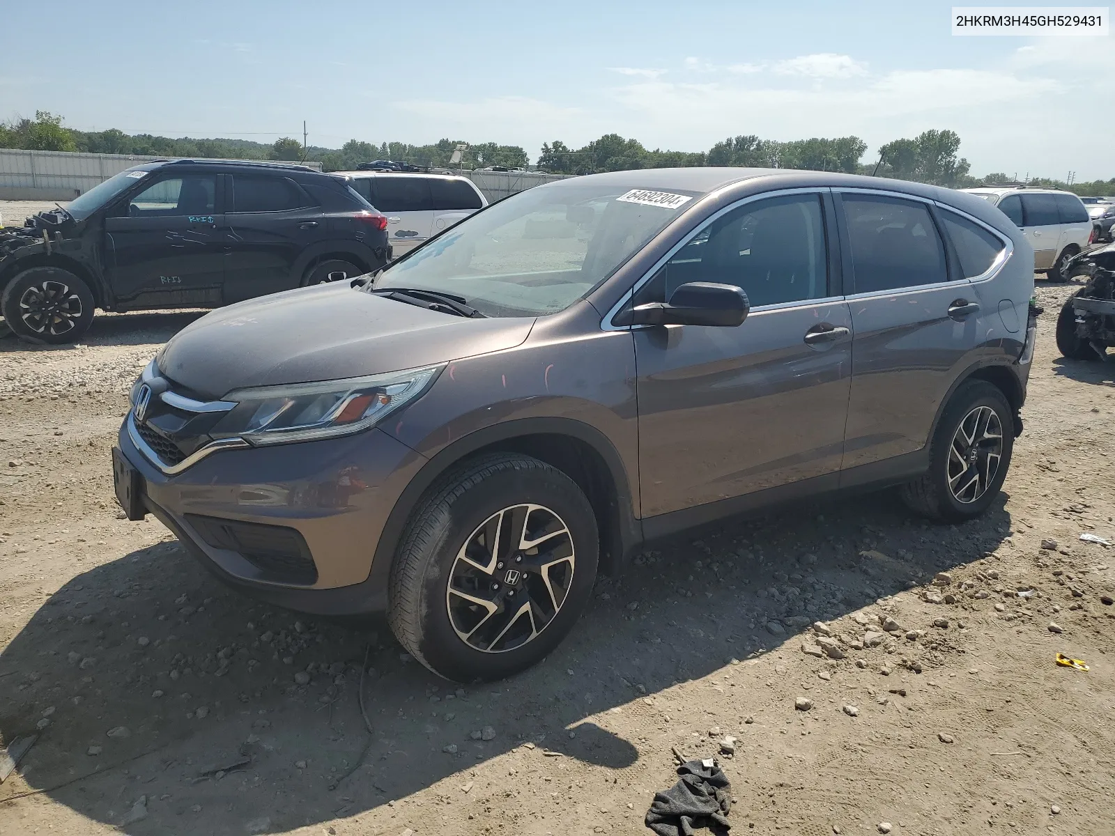 2016 Honda Cr-V Se VIN: 2HKRM3H45GH529431 Lot: 64692304