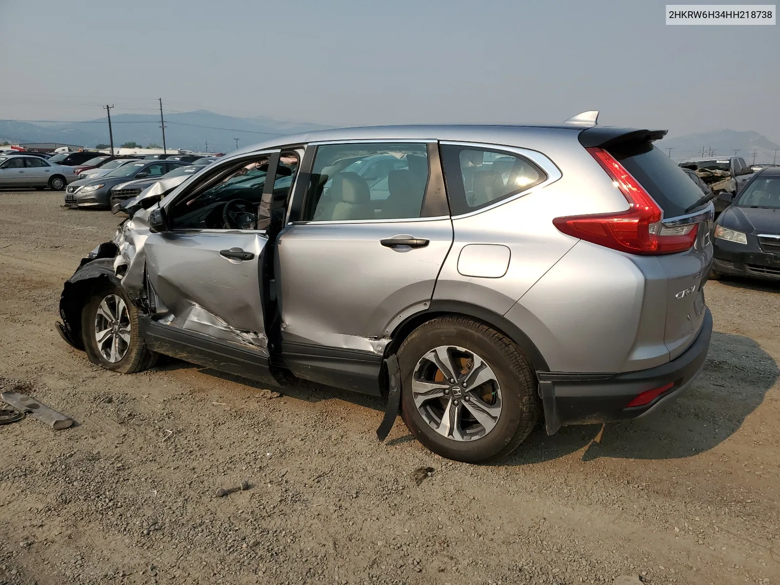 2017 Honda Cr-V Lx VIN: 2HKRW6H34HH218738 Lot: 64704744