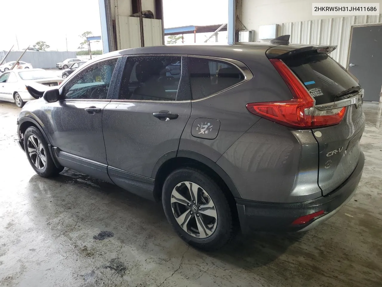 2018 Honda Cr-V Lx VIN: 2HKRW5H31JH411686 Lot: 62541354