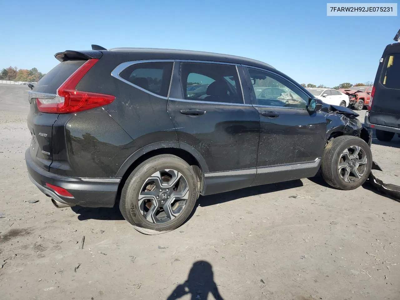 2018 Honda Cr-V Touring VIN: 7FARW2H92JE075231 Lot: 77615744