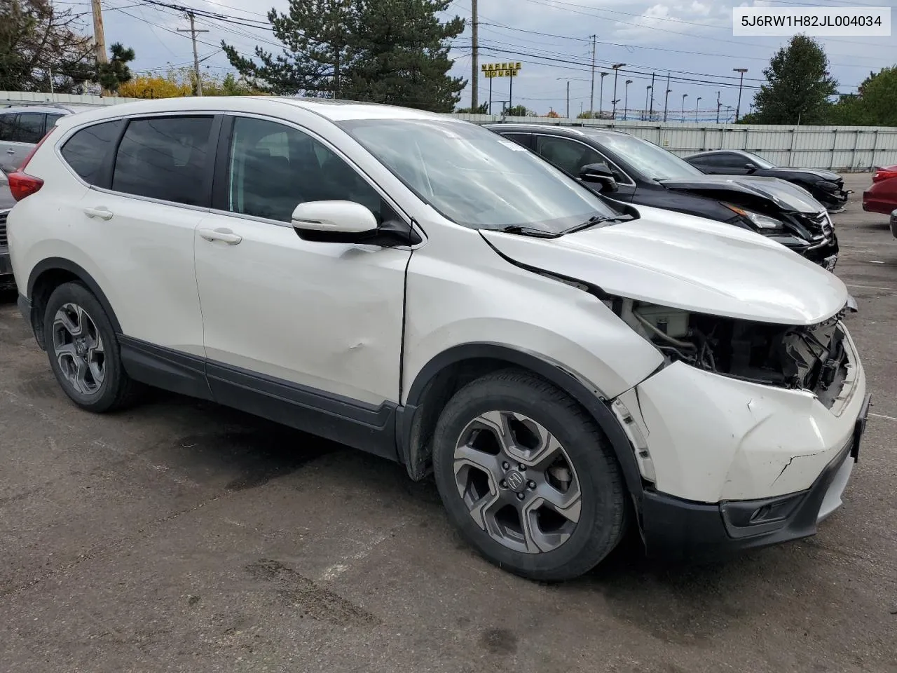 2018 Honda Cr-V Exl VIN: 5J6RW1H82JL004034 Lot: 77777394