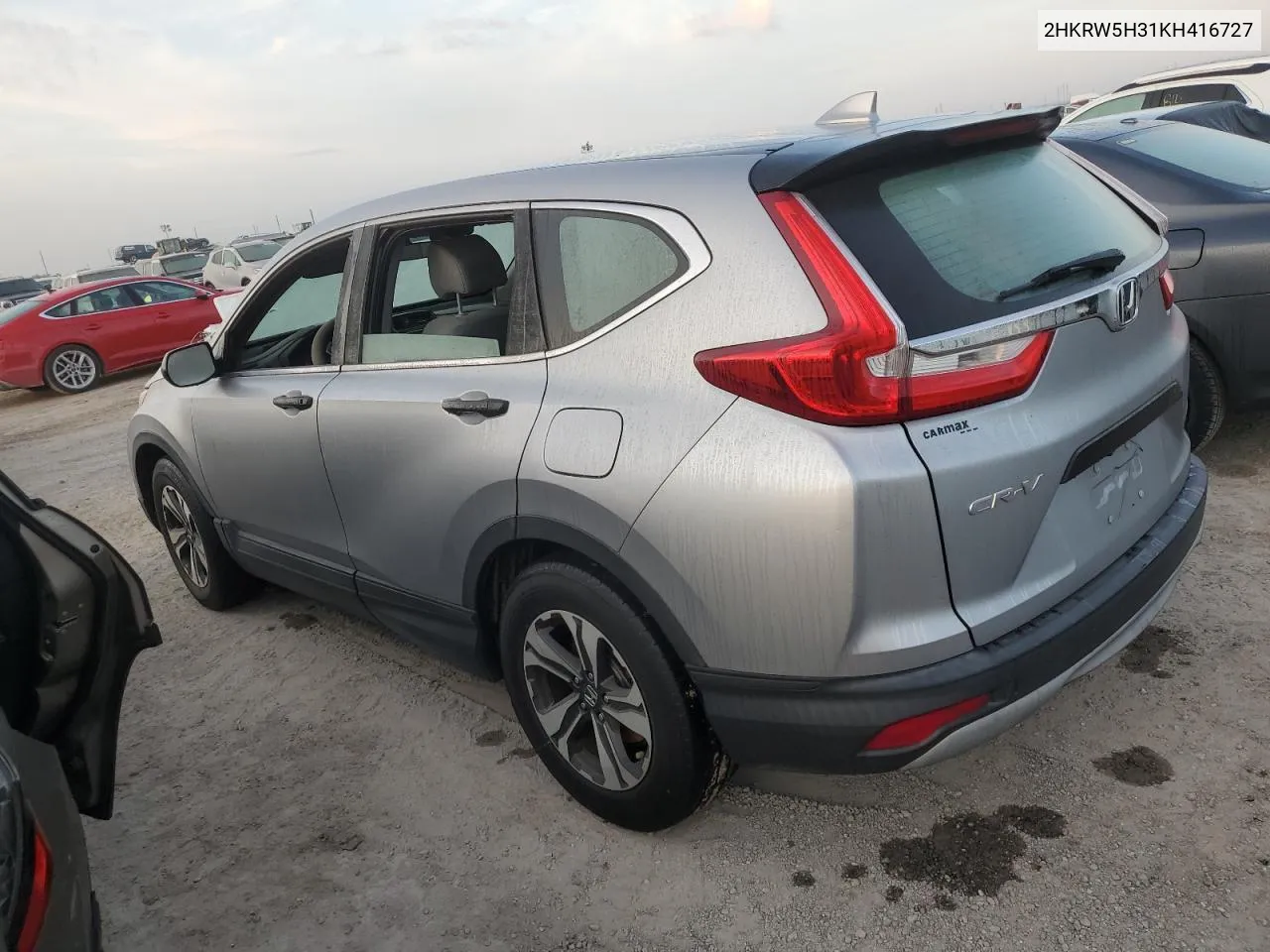 2019 Honda Cr-V Lx VIN: 2HKRW5H31KH416727 Lot: 76198474