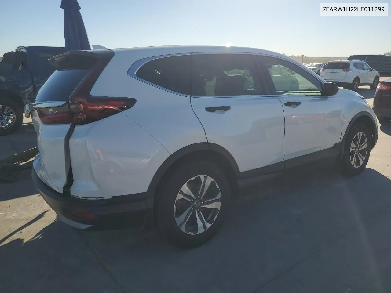 2020 Honda Cr-V Lx VIN: 7FARW1H22LE011299 Lot: 81418174