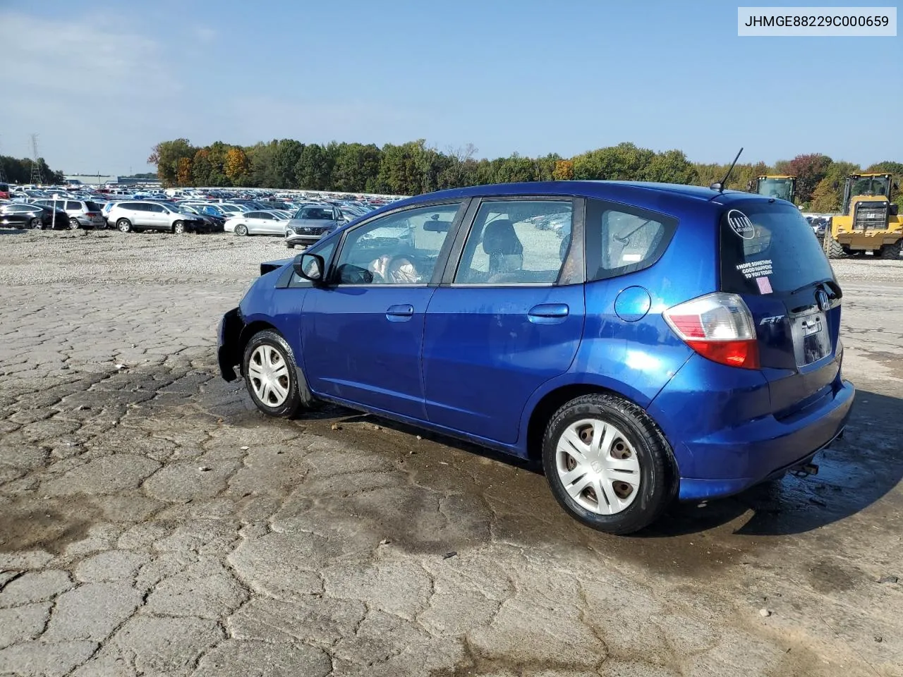 2009 Honda Fit VIN: JHMGE88229C000659 Lot: 77795354