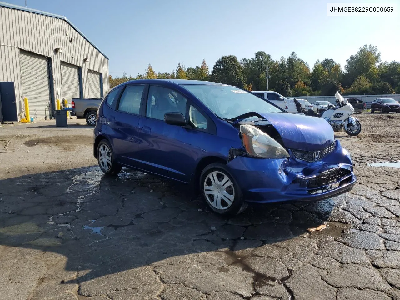 2009 Honda Fit VIN: JHMGE88229C000659 Lot: 77795354