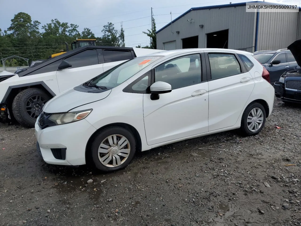 2016 Honda Fit Lx VIN: JHMGK5H59GS009797 Lot: 65593264