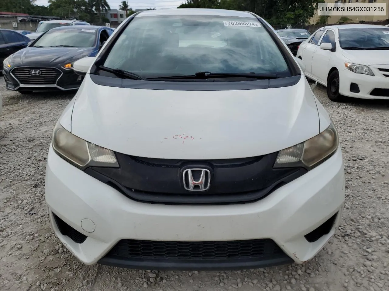 2016 Honda Fit Lx VIN: JHMGK5H54GX031256 Lot: 70399394