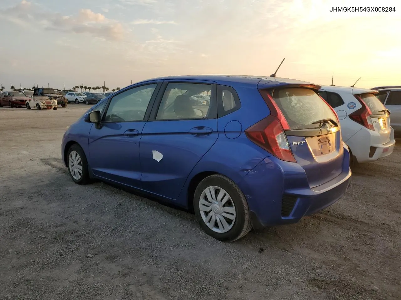 2016 Honda Fit Lx VIN: JHMGK5H54GX008284 Lot: 76003384