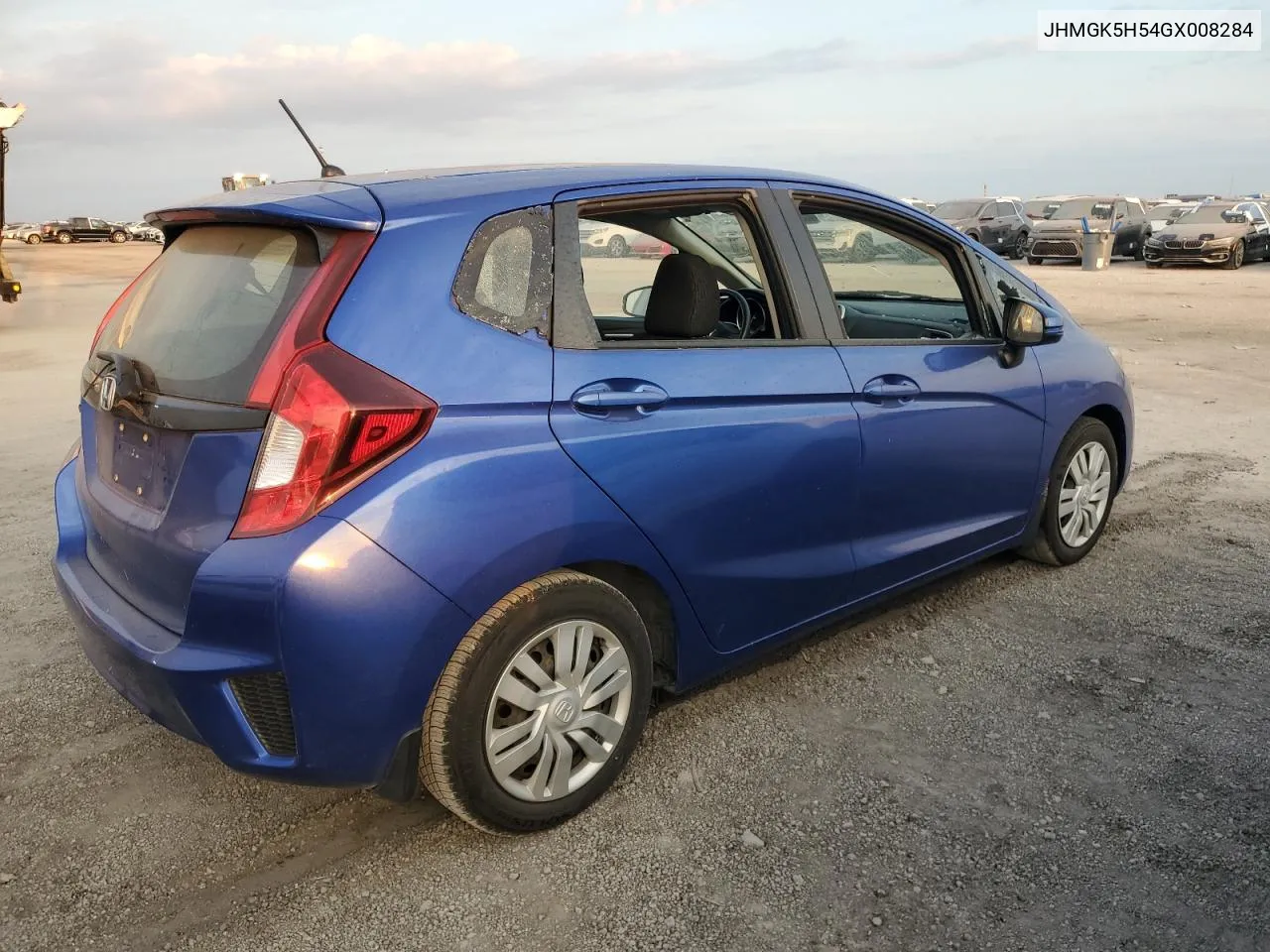 2016 Honda Fit Lx VIN: JHMGK5H54GX008284 Lot: 76003384