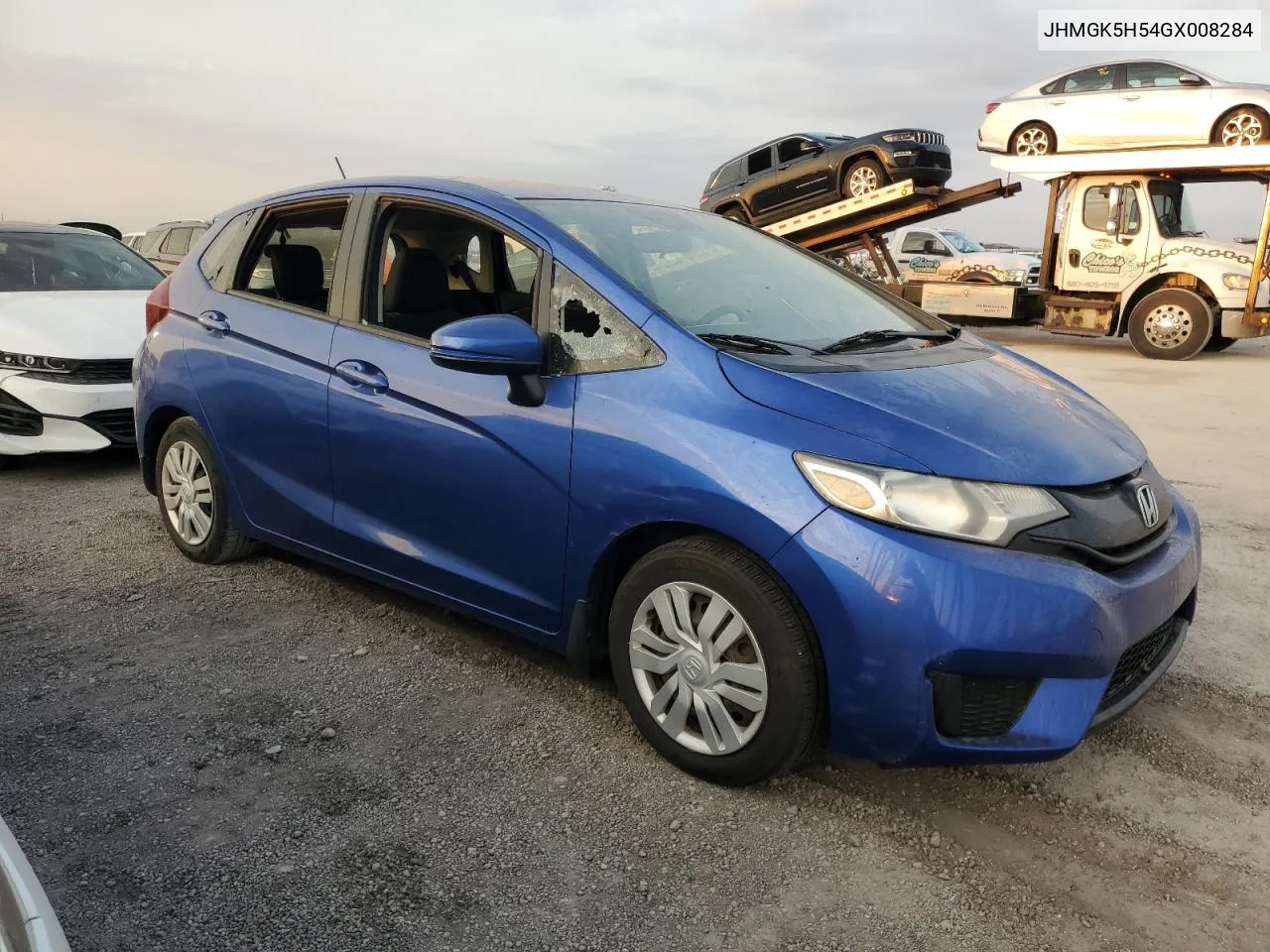 2016 Honda Fit Lx VIN: JHMGK5H54GX008284 Lot: 76003384