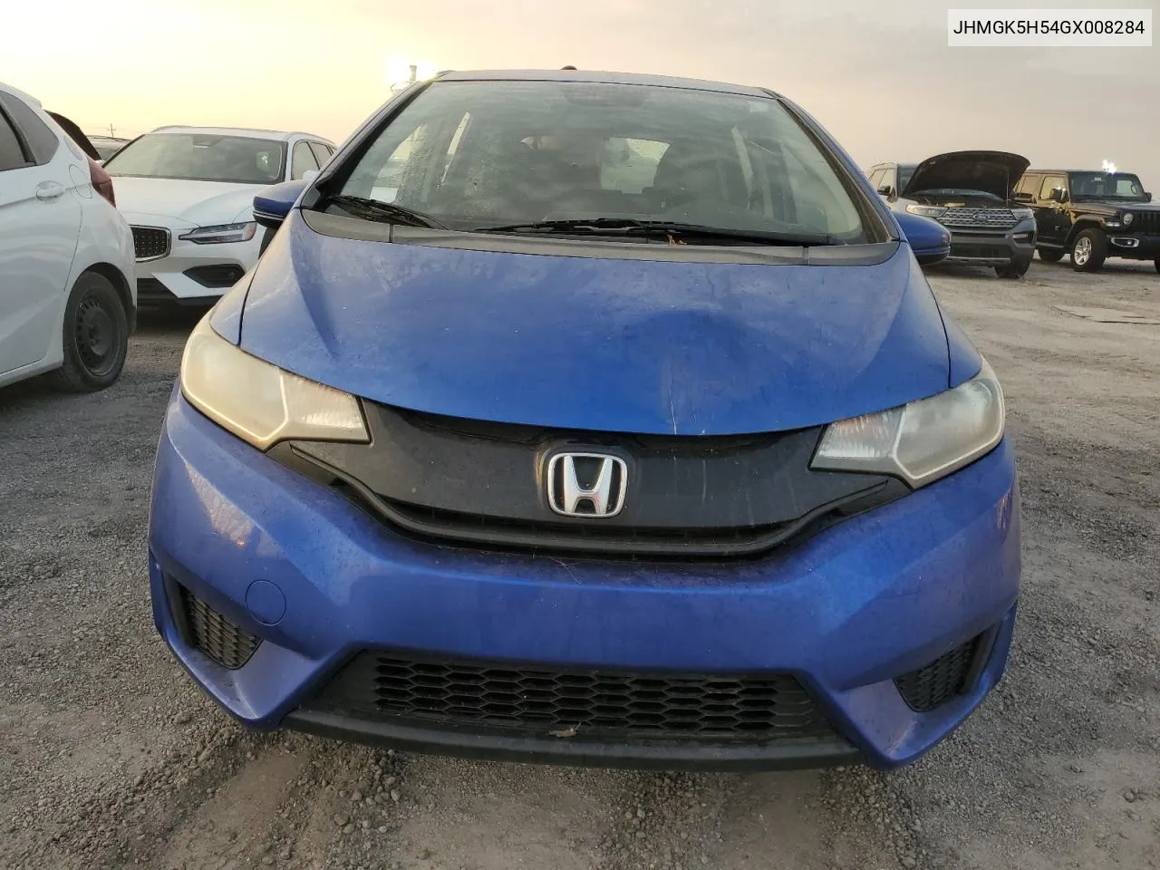 2016 Honda Fit Lx VIN: JHMGK5H54GX008284 Lot: 76003384