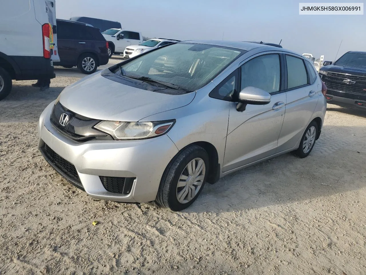 2016 Honda Fit Lx VIN: JHMGK5H58GX006991 Lot: 76008924