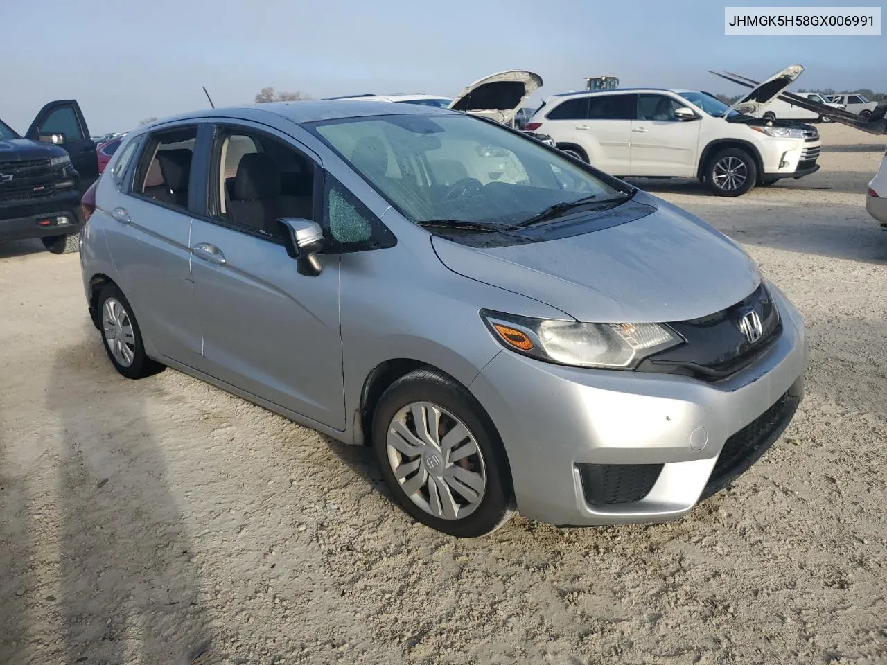 2016 Honda Fit Lx VIN: JHMGK5H58GX006991 Lot: 76008924