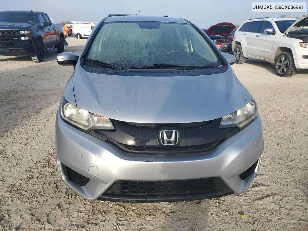 2016 Honda Fit Lx VIN: JHMGK5H58GX006991 Lot: 76008924