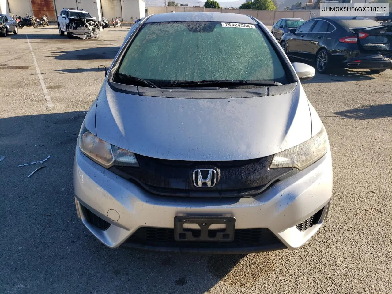 2016 Honda Fit Lx VIN: JHMGK5H56GX018010 Lot: 76424554