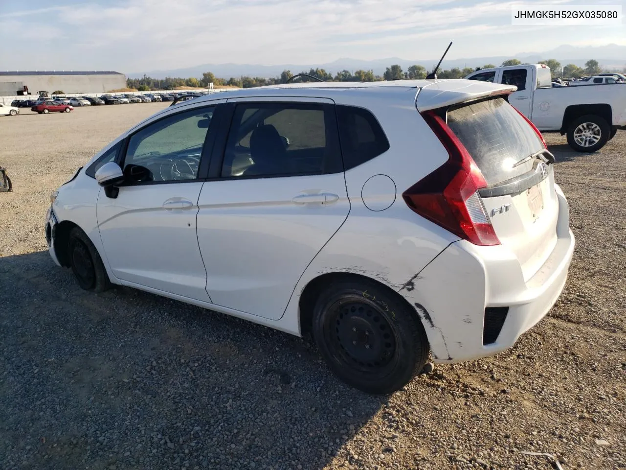 2016 Honda Fit Lx VIN: JHMGK5H52GX035080 Lot: 77215374