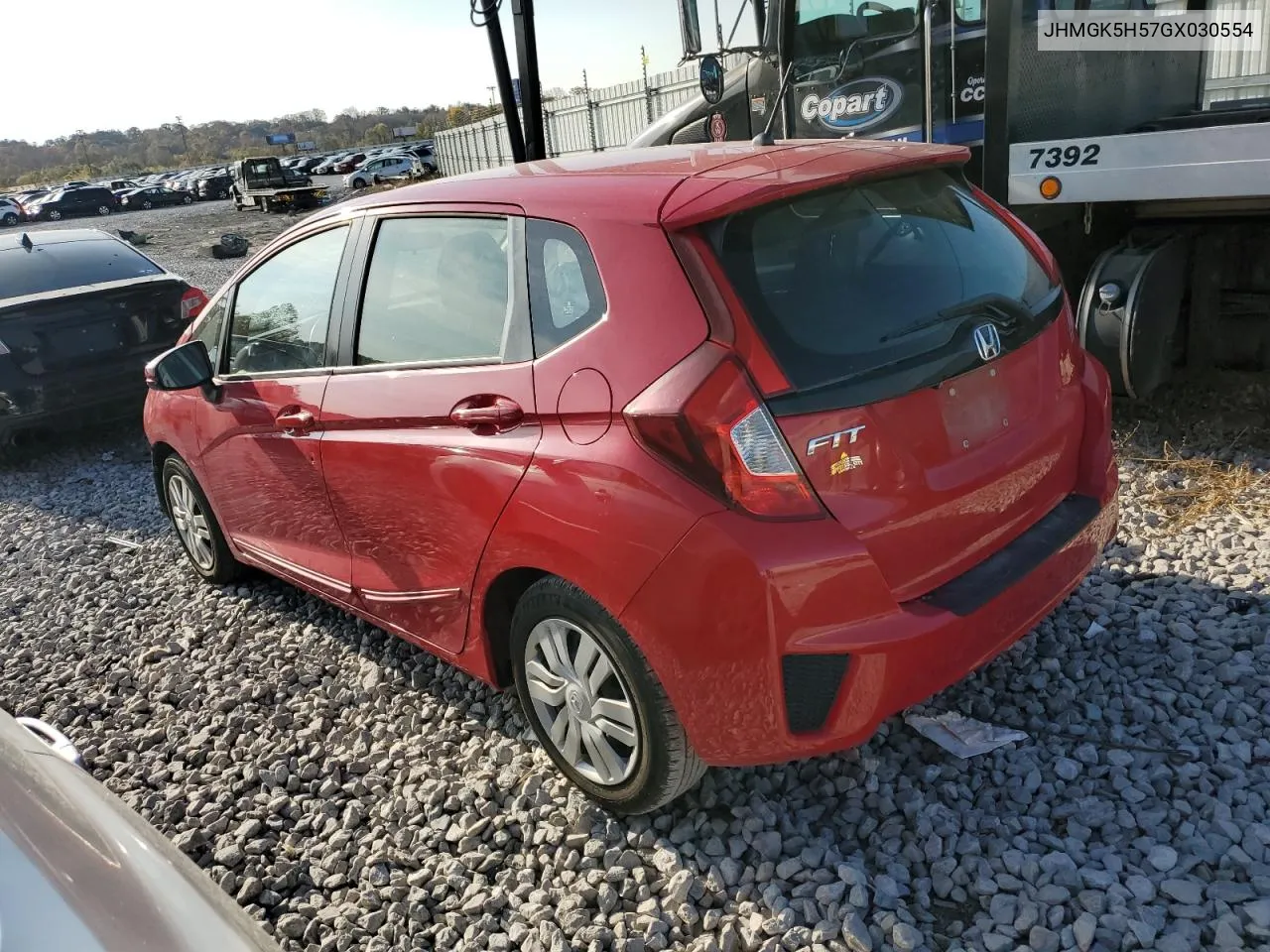 2016 Honda Fit Lx VIN: JHMGK5H57GX030554 Lot: 77676884